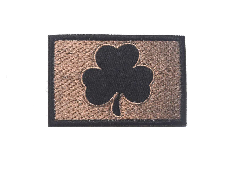 Outdoor embroidered fabric badge with velcro backing showing camouflage design