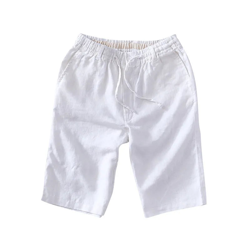 Men's loose-fitting linen capri trousers in a straight-leg style on a neutral background.