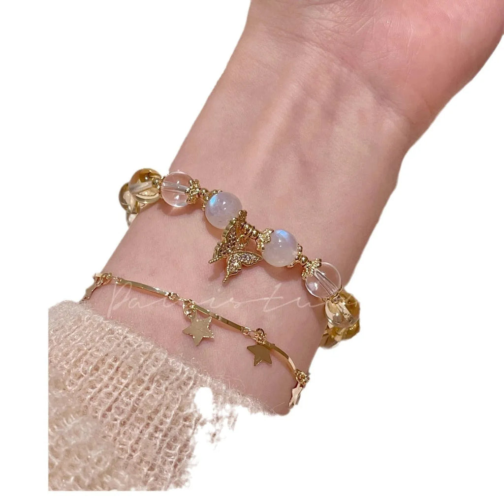 Moonstone white crystal bracelet with citrine butterfly motif and elastic closure