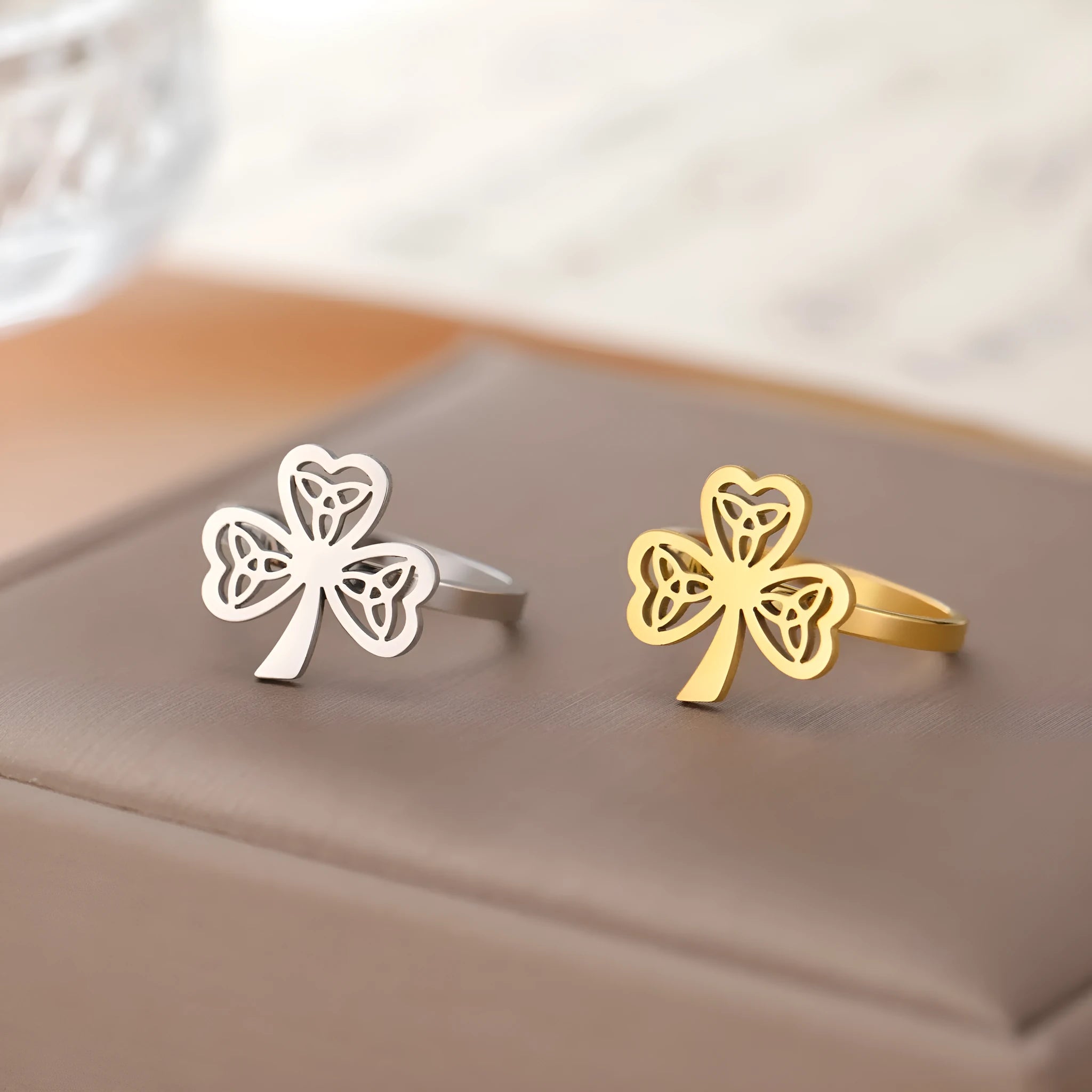 Stainless steel hollow fashion ring in gold or steel finish