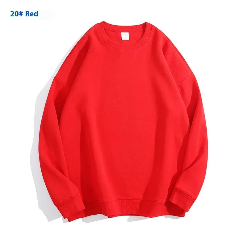 Cotton off shoulder pullover sweater in a loose fit, shown in a solid colour with long sleeves.
