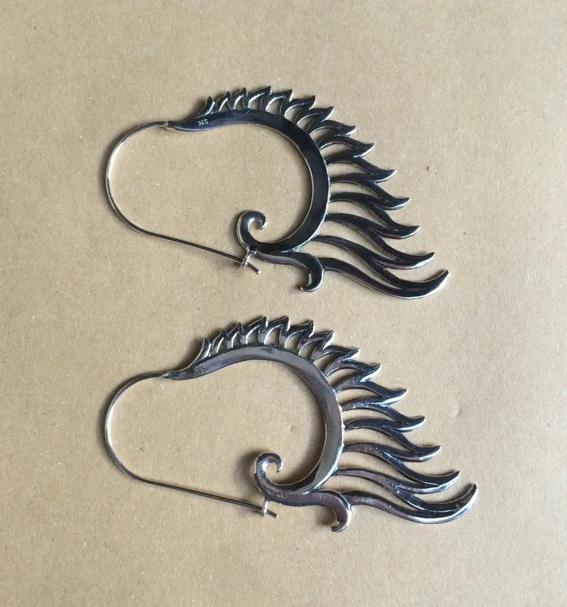 Silver retro creative women's earrings made from electroplated alloy in fashion OL style