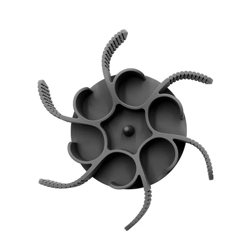 Grey silicone dog slow feeder insert with spiral design and suction cups on base
