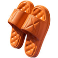 Pair of soft EVA non-slip bathroom slippers with a thick sole, shown in a choice of colours.