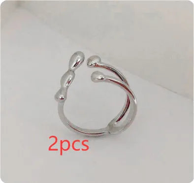 Brass women's fashion ring with spherical design in gold or silver colour