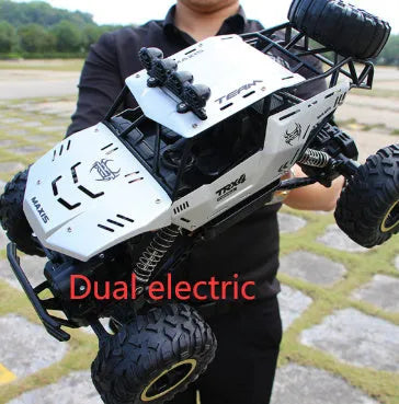 Large black 4WD remote control climbing car and smaller silver high-speed model with 2.4G remote.