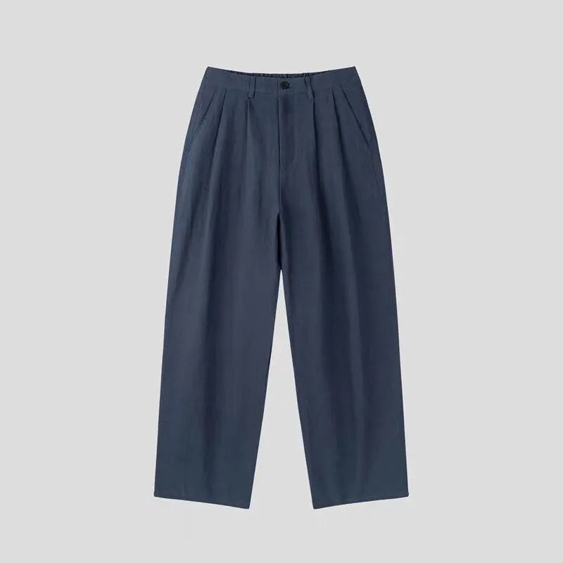 Men's light-weight apricot wide-leg cotton linen trousers with a non-iron finish on a hanger.
