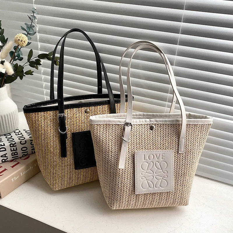 Women's retro style straw woven shoulder bag in black with large capacity and three-dimensional pocket