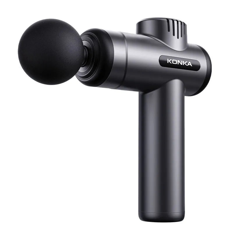 Konka professional electric mini massage gun in grey with multiple massage heads on a table