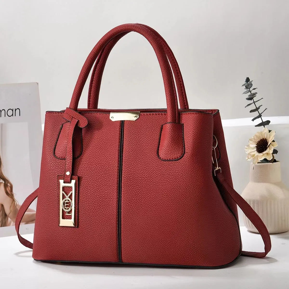 Women's large capacity shoulder bag in soft PU leather with adjustable strap and multiple colour options