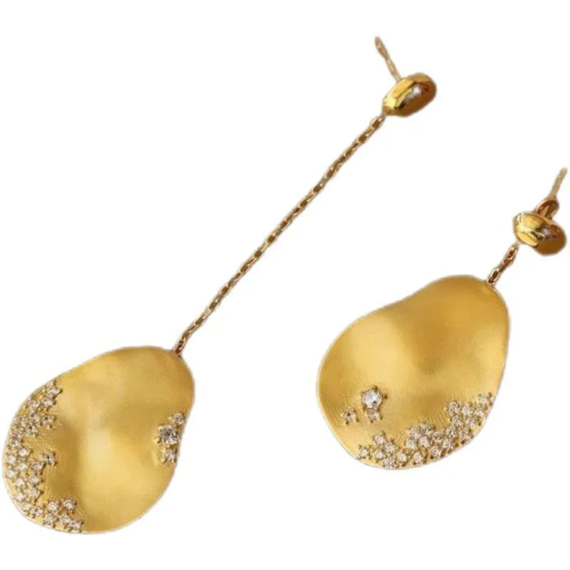 Chinese style asymmetrical floral earrings with zircon detailing in gold or silver finish
