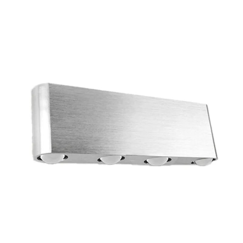 Silver aluminium rectangular LED wall lamp with multicolour lighting options on bedroom wall