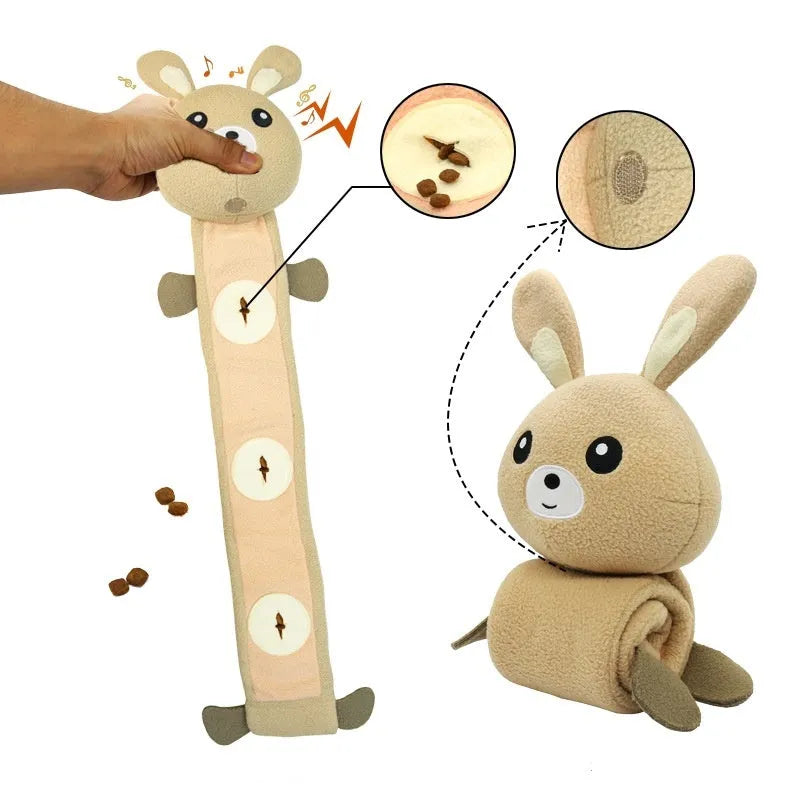 Poached bunny coloured plush dog toy with food compartments measuring 650mm long