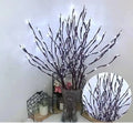 LED decorative tree light with silver artificial branches in vase base showing multiple colour options