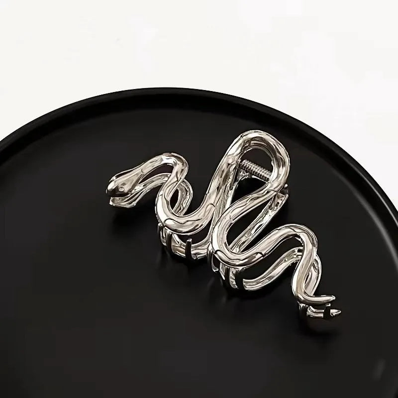 Silver Slytherin serpentine snake design metal hair barrette measuring 10.5cm.