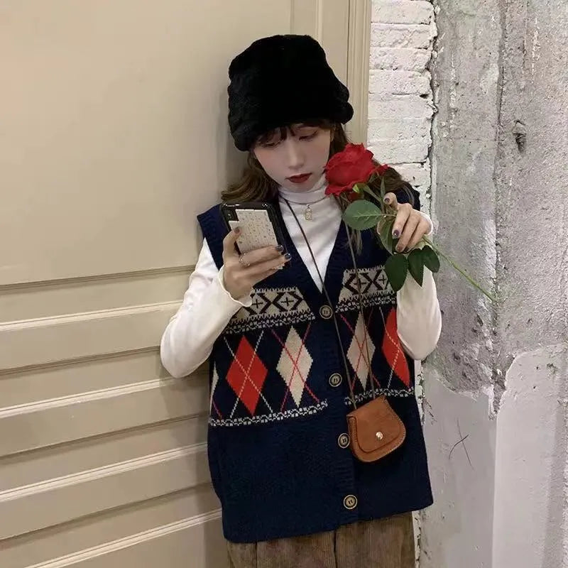 Loose diamond plaid sleeveless cardigan top in khaki colour showing pattern detail