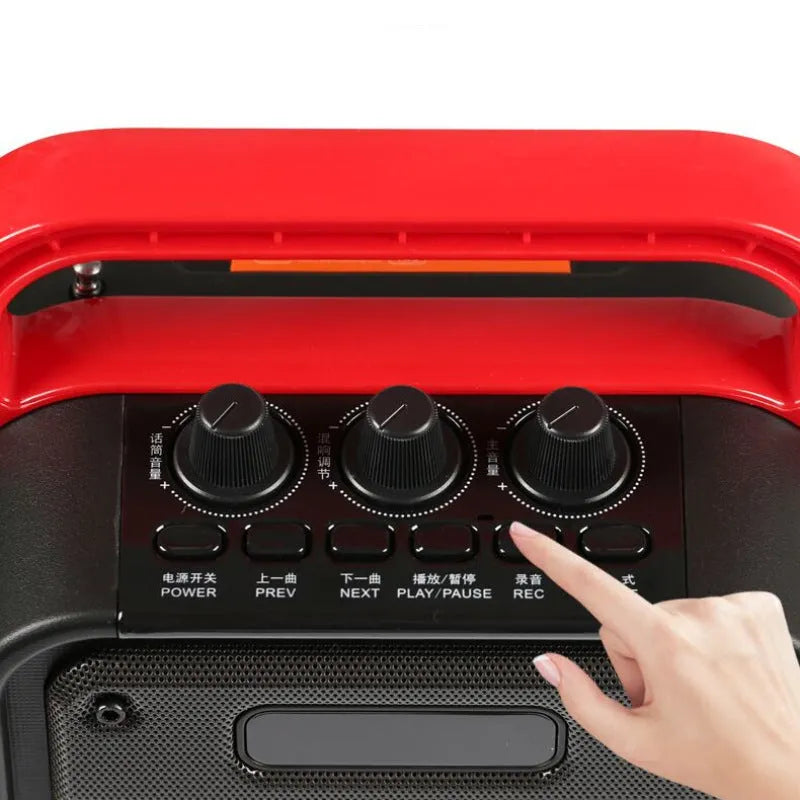 MS62AI portable Bluetooth speaker with wireless microphone showing plastic casing and control buttons