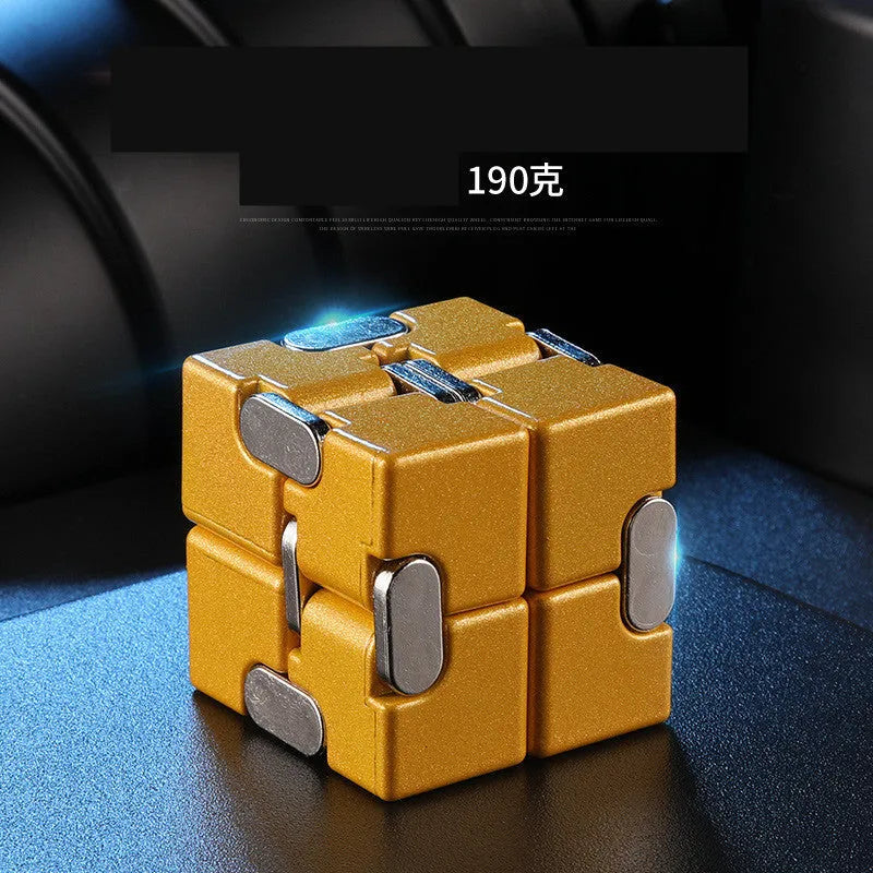 Black zinc alloy infinity cube fidget toy showing eight connected cubes.