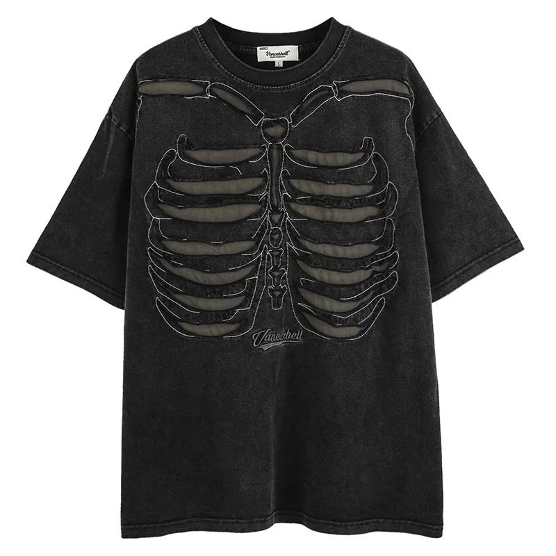 Man modelling a black loose-fit cotton short sleeve top with a skull and letters print.