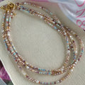 Women's natural pearl bracelet and necklace set with 14K gilded purple silver accents on irregular mini pearls