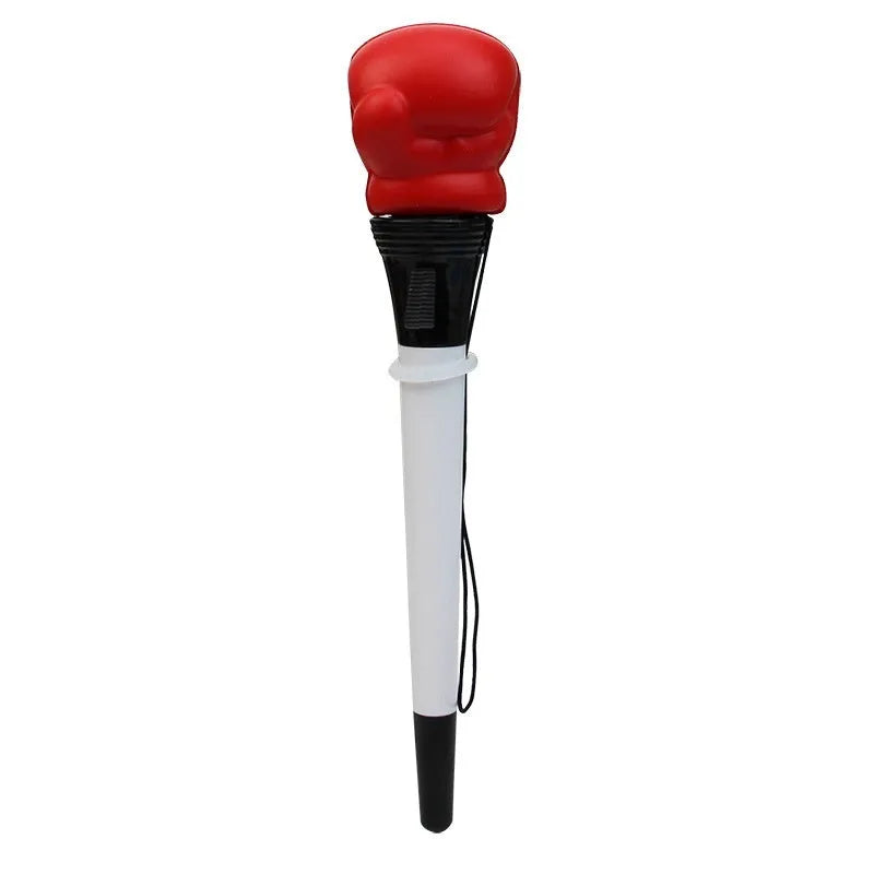 Four black pressure relief boxing press ejection pens with plug-in sleeve mechanisms on a desk.
