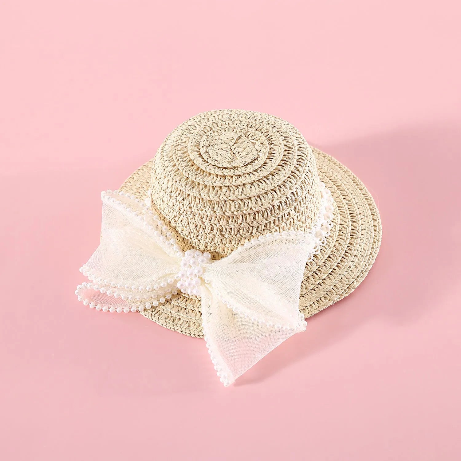 Woven straw cat hat with a pearl bow, shown in blue, pink, purple, and white colour options