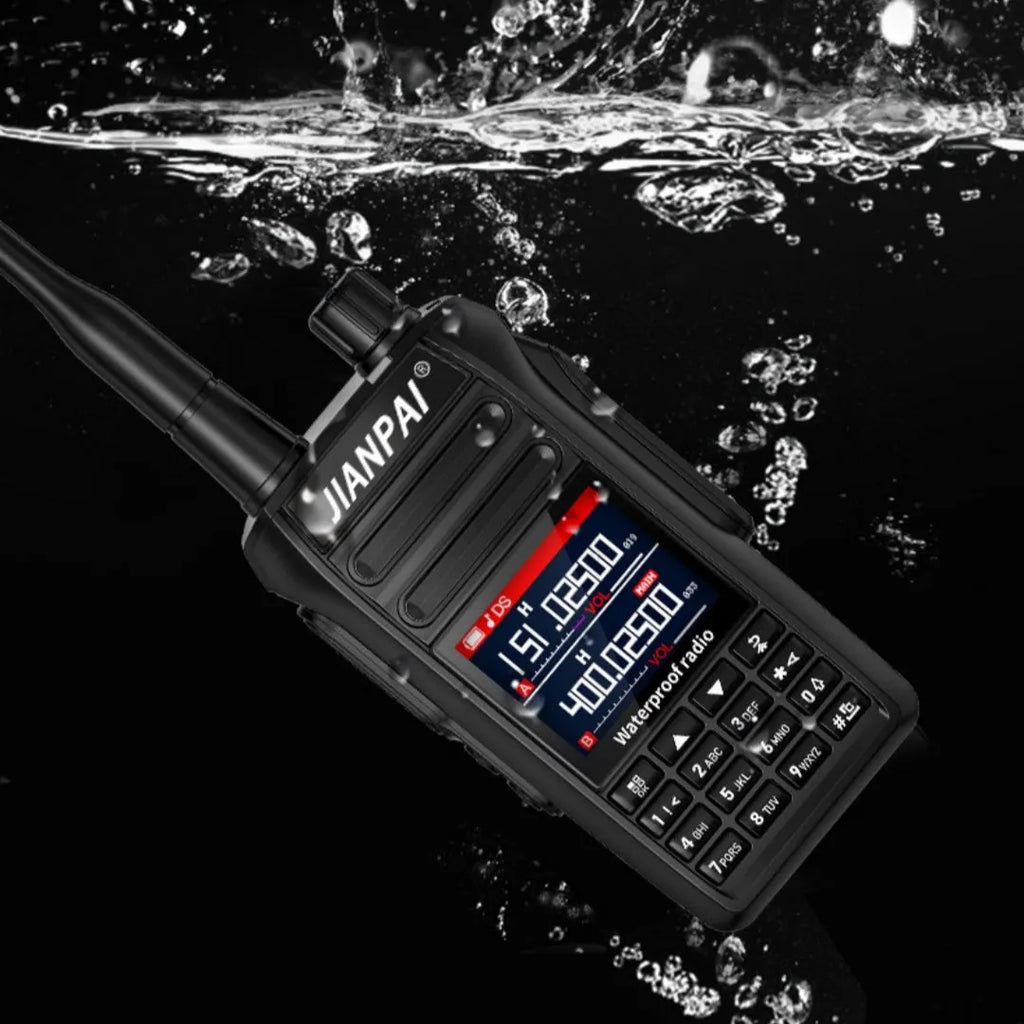 Black Interphone waterproof aviation headset with antenna, battery, charger, cable, and accessories on a table