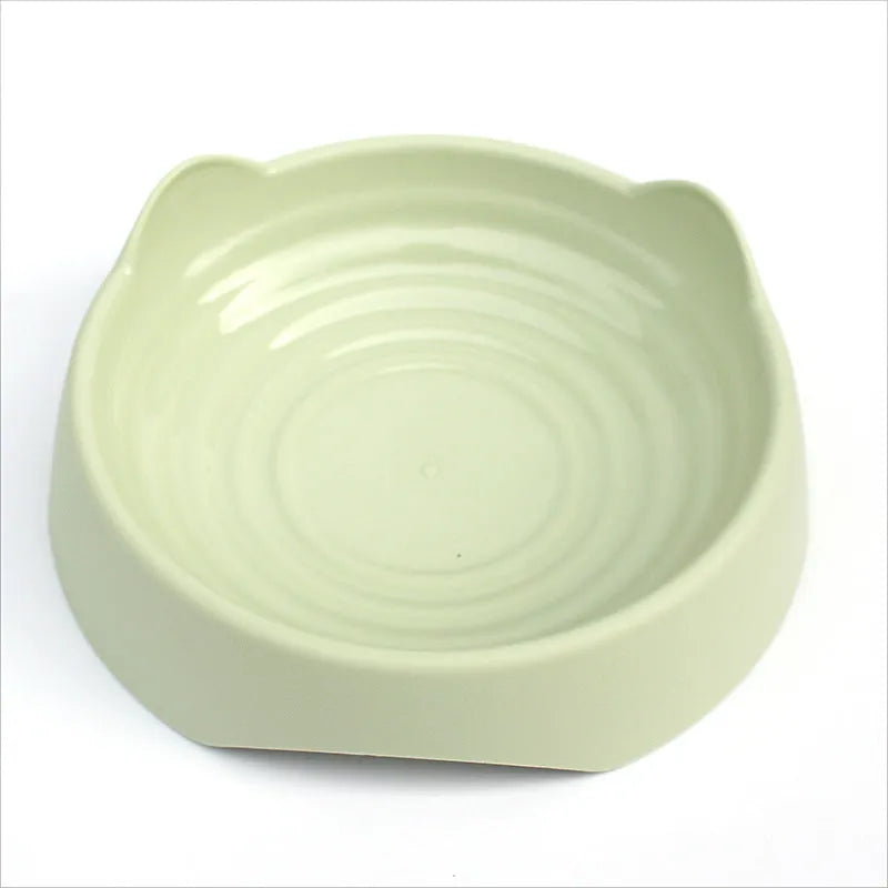 Ceramic dog slow feeder bowl with puzzle maze design in blue, green and pink colours showing S and L size options