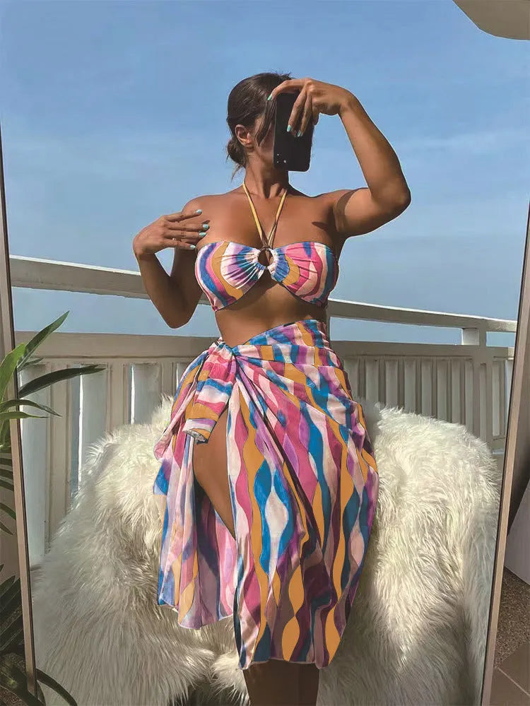 Yellow green women's split swimsuit three-piece set with printed beach skirt.