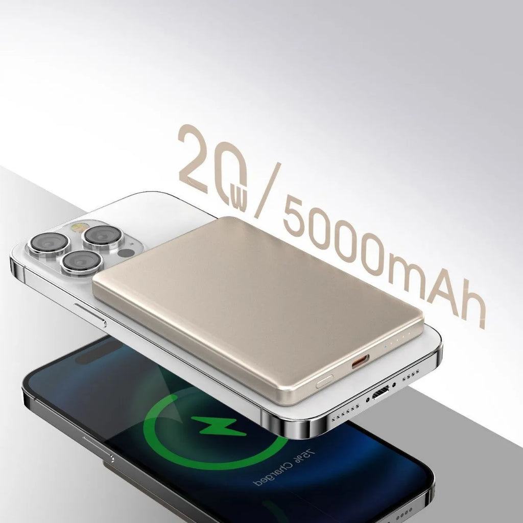Magnetic wireless power bank with alloy shell in black, compact portable charger on a plain background