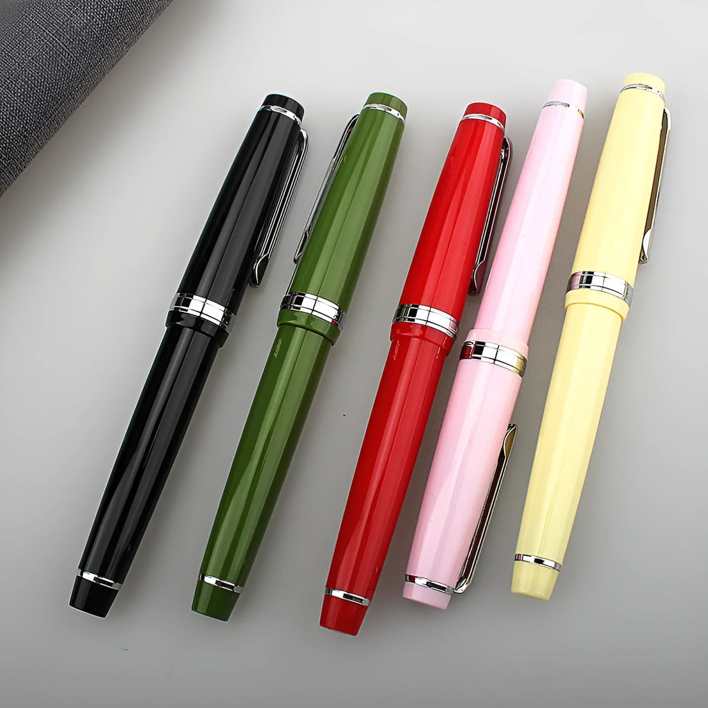 Short pocket business pen with resin body and stainless steel nib, shown with gold clip