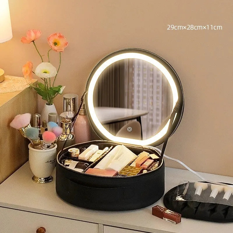 Round smart LED makeup bag with integrated mirror lights in cherry blossom pink colour with lattice partitions visible