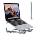 Grey aluminium alloy laptop docking station with folding stand and multiple ports