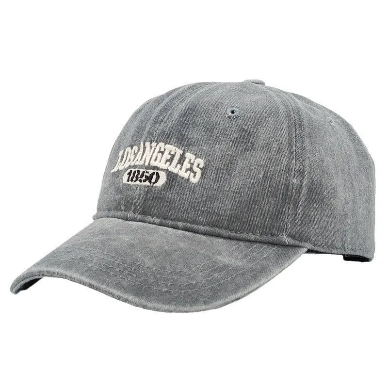 Retro personalised peaked cap with letters embroidery in beige, adjustable strap visible.
