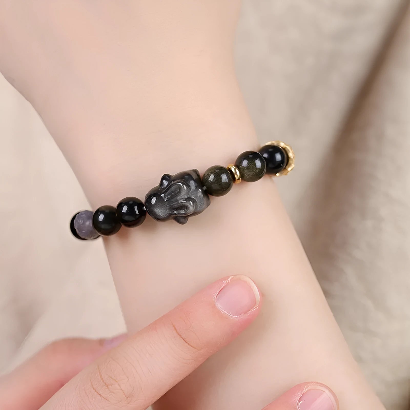 Handmade obsidian bracelet with lying rabbit charm in Jin Yaoshi and grey agate beads