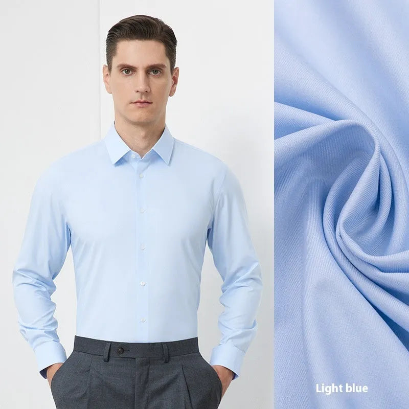 Man wearing a light blue long-sleeved non-iron business casual shirt with a regular fit.