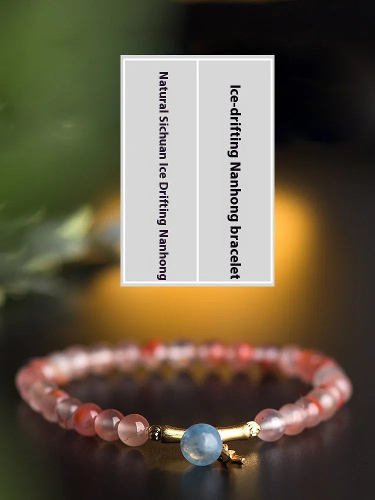 Nanhong agate bracelet with flower design and bamboo joint elements on wrist