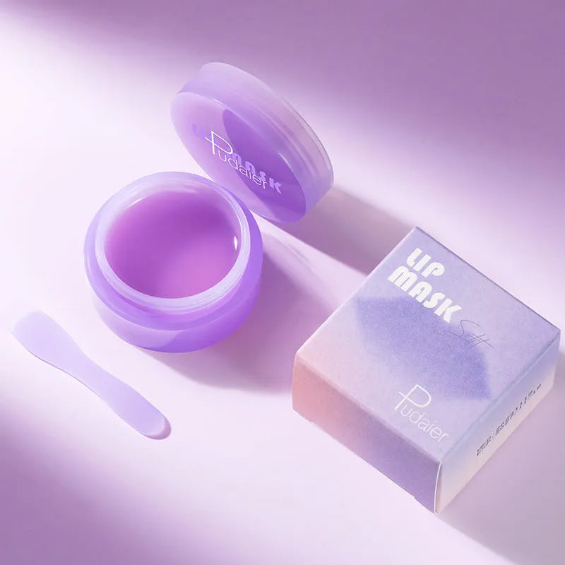 Exfoliating lip balm treatment with scraper tool in packaging
