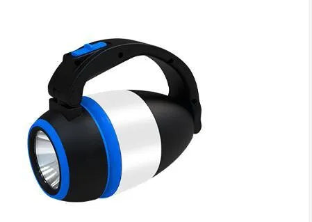 Black green multifunctional LED camping lamp with USB port shown next to a mobile phone.