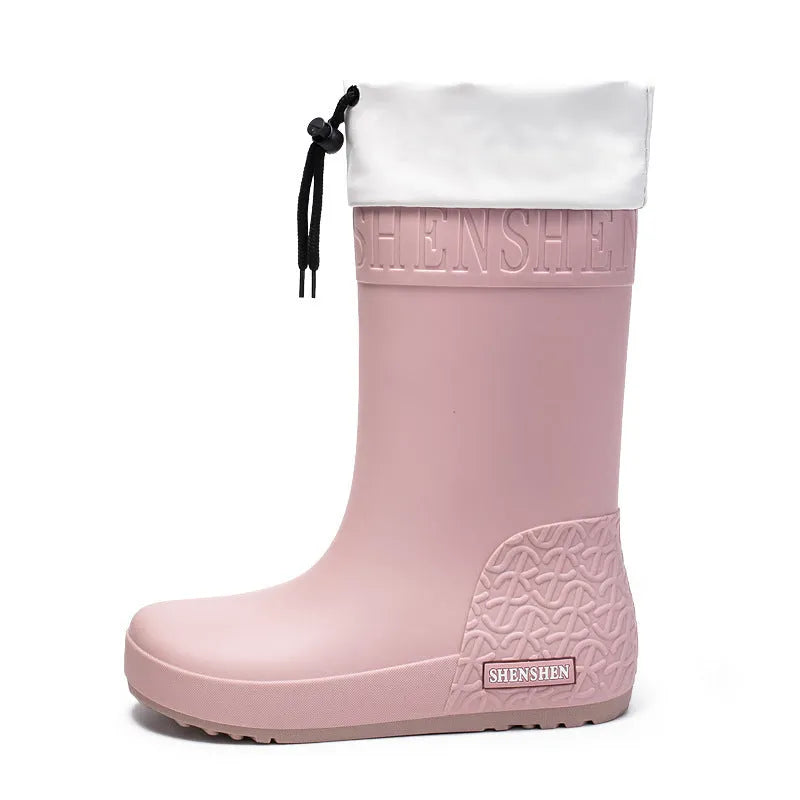Women's solid colour PVC rain boots with non-slip soles in apricot, black, brown, or pink waterproof mouth options