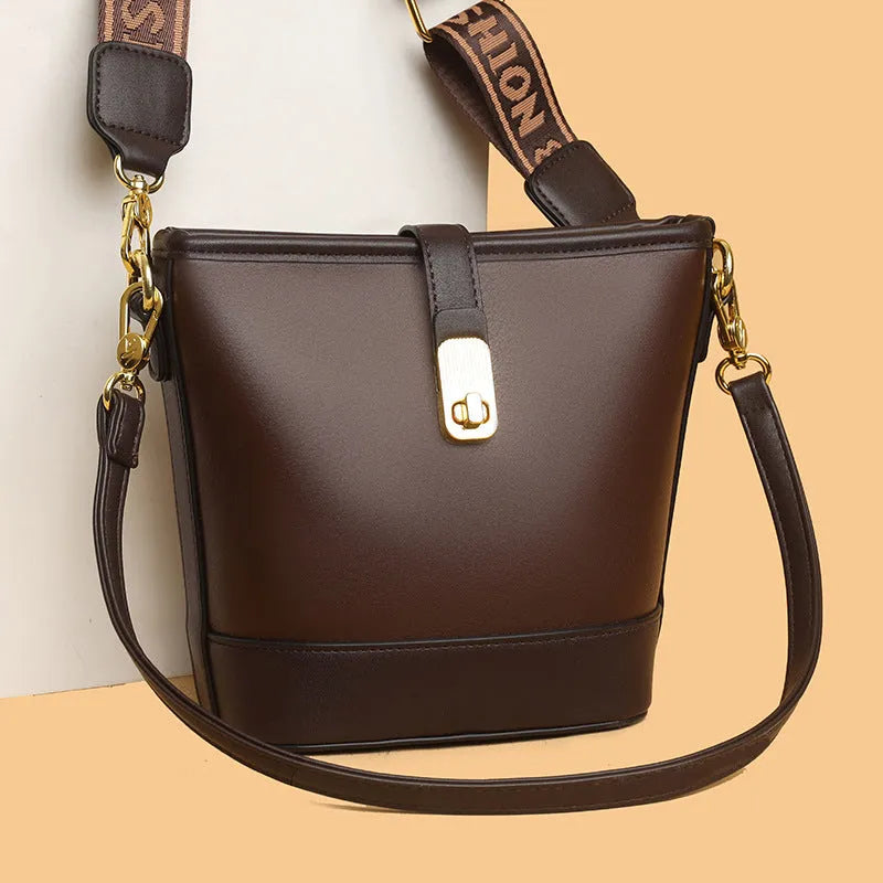 Korean fashion bucket bag in black PU leather with double shoulder straps and organised interior compartments