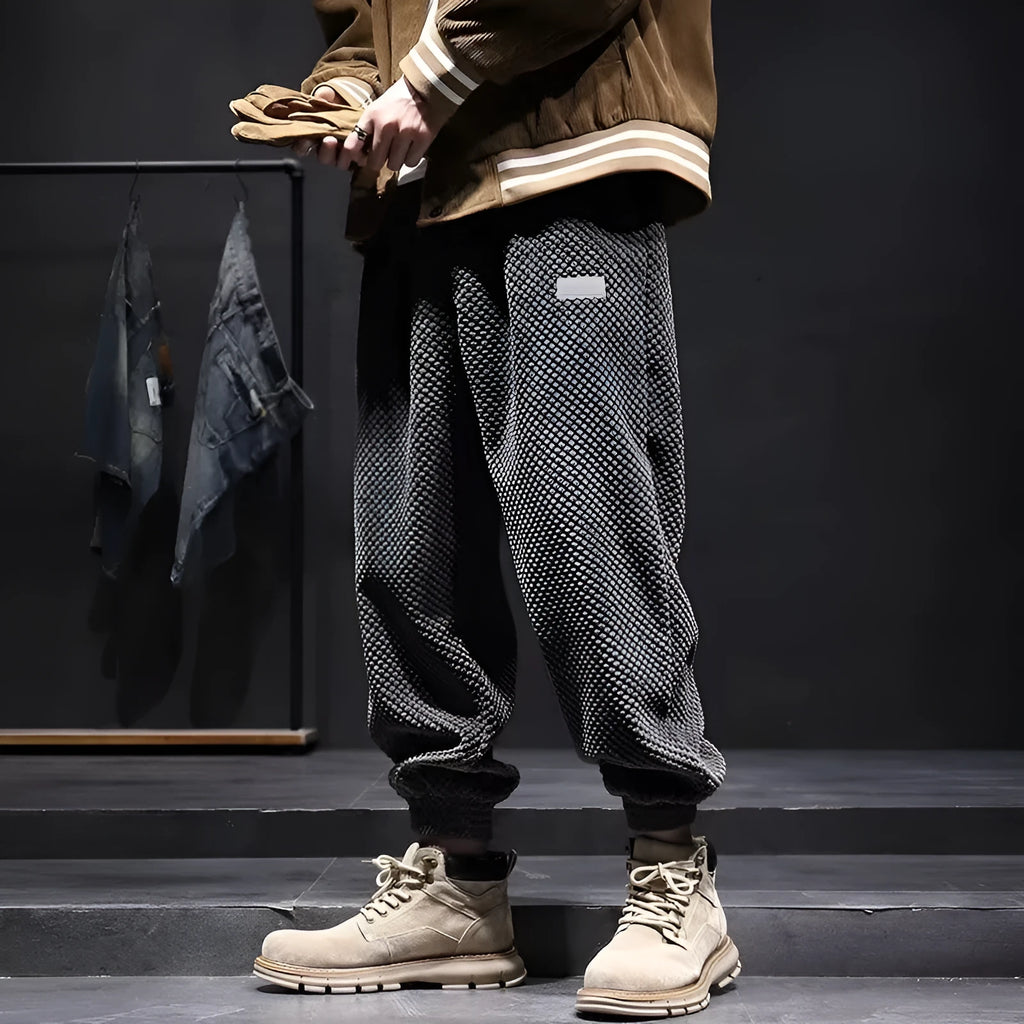 Men's grey ankle strap sweatpants with straight leg design and non-iron polyester blend fabric
