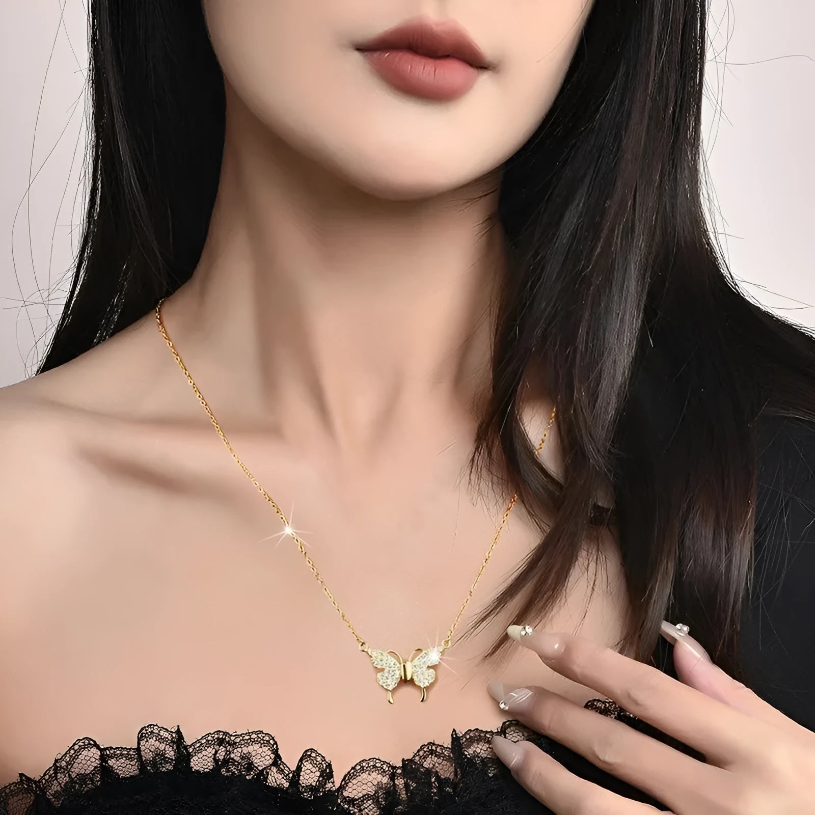 Gold titanium steel women's necklace with magnetic butterfly clasp and twisted chain.