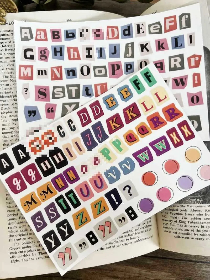 Sheet of cute style decorative stickers showing printed English alphabet letters and weekly words.