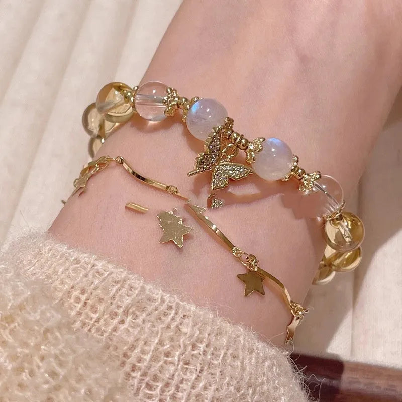 Moonstone white crystal bracelet with citrine butterfly motif and elastic closure