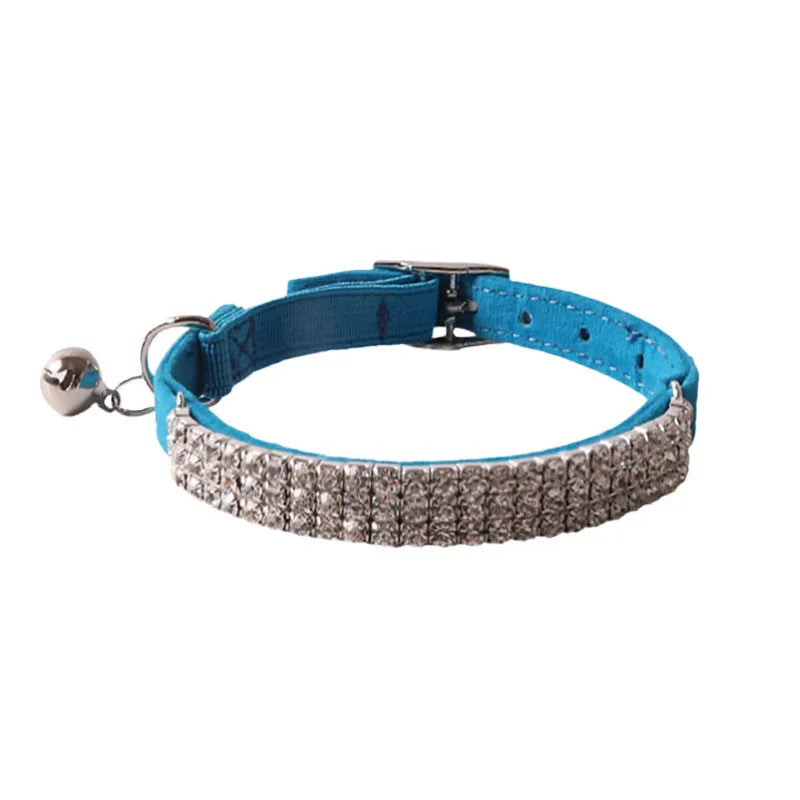 Elastic buckle cat collar with flocking material in gang drill design, shown in multiple colours.