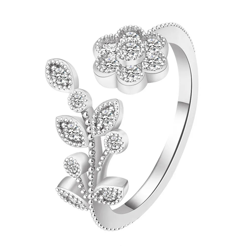 Gold diamond treated copper open ring with flower and leaf design for women
