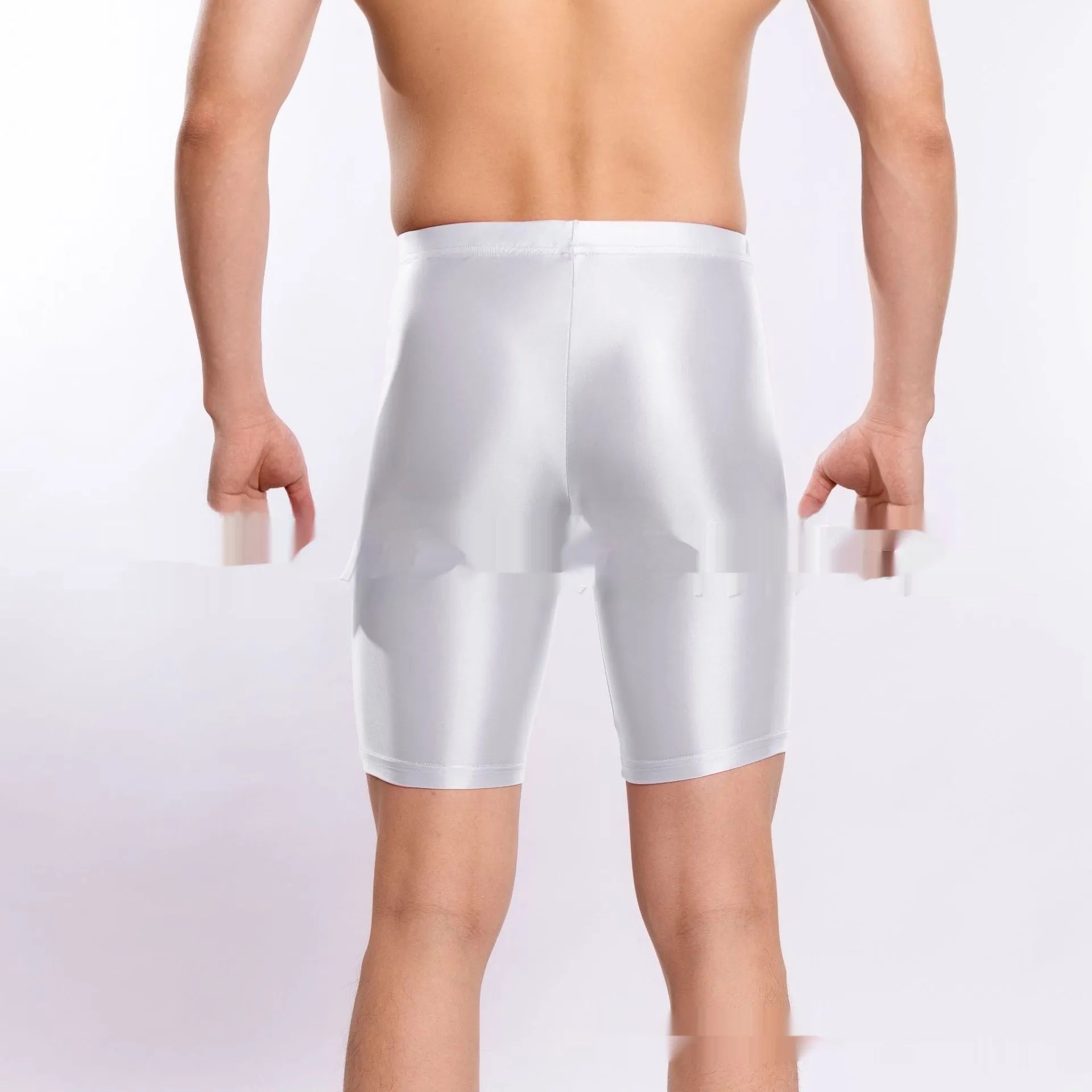 Plus size shiny nylon sports shorts for men in multiple colours on a size chart.