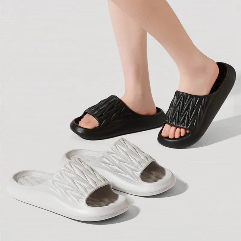 Leaf texture design EVA slippers for indoor summer and bathroom use.