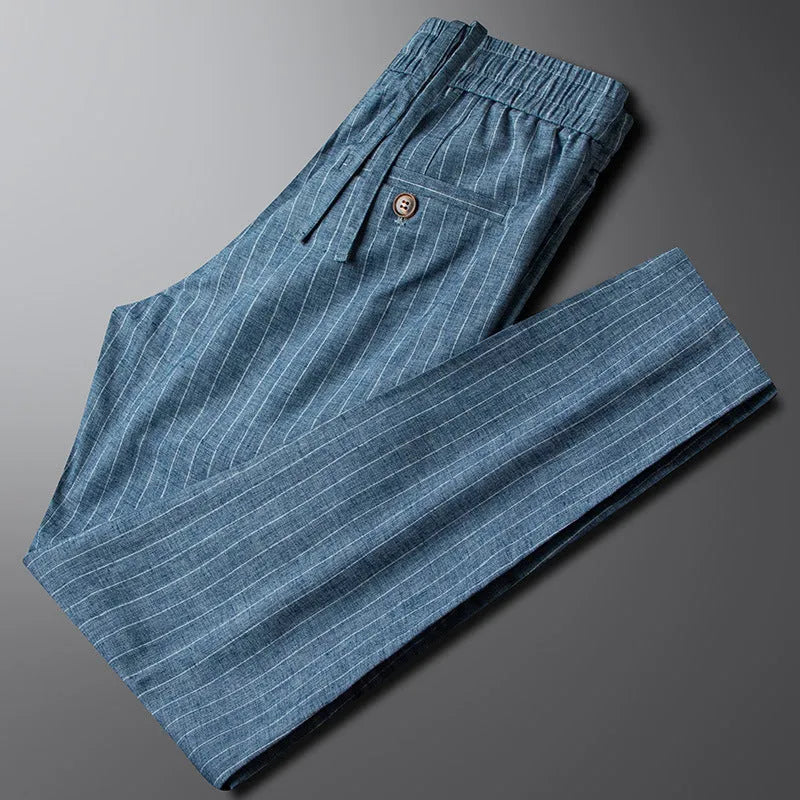 Men's casual linen striped trousers in blue gray, showing elasticated waist and straight leg